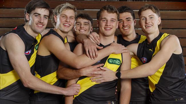 NCA. MELBOURNE, AUSTRALIA. 21th November 2024. AFL Draft at Marvel Stadium. First round draft selections gather at Marvel Stadium the morning after the draft. 6 new tiger cubs. L-R. Jonty Faull, Josh Smillie, Taj Hotton, Sam Lalor, Harry Armstrong and Luke Trainor. Picture: Michael Klein