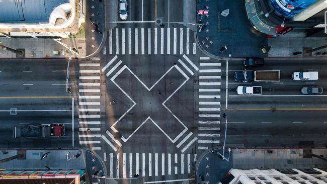 An aerial view at the pedestrian intersection at Hollywood Blvd and Highland Ave during morning rush hour in Los Angeles. Picture: AFP