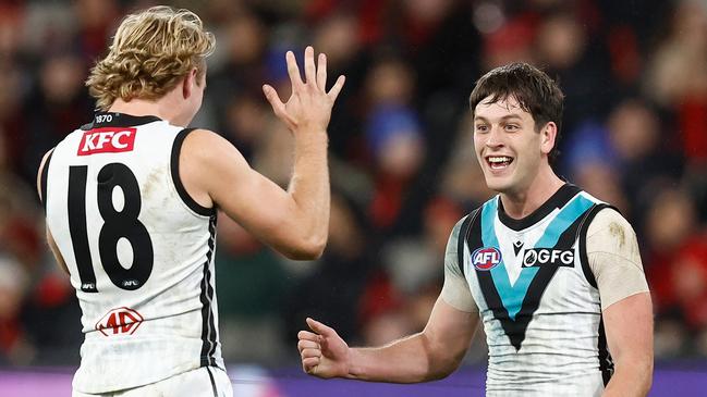 MELBOURNE, AUSTRALIA – JULY 01: Jason Horne-Francis of the Power and Zak Butters of the Power (right) celebrate during the 2023 AFL Round 16 match between the Essendon Bombers and the Port Adelaide Power at the Melbourne Cricket Ground on July 1, 2023 in Melbourne, Australia. (Photo by Michael Willson/AFL Photos via Getty Images)