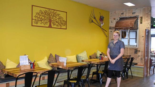 Sharla Watson in the new, renovated Farmer and Sun Cafe, which offers more space and an eclectic, rustic, vintage vibed decor. Picture: Donna Jones