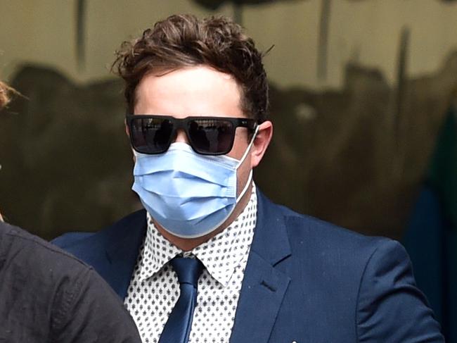 MELBOURNE, AUSTRALIA - NewsWire Photos APRIL 12TH, 2023: Sentence for Shaun Bloomfield (in mask), who was convicted of raping a friend at a 21st birthday party in 2016, at County Court Victoria. Picture : NCA NewsWire / Nicki Connolly