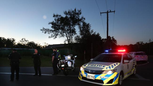 A police at a roadblock on the corner of Adare and Redbank Creek Rds, Gatton on Monday night. Picture: Richard Waugh