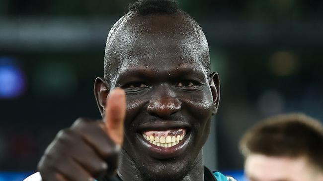 MELBOURNE, AUSTRALIA - JUNE 09: Aliir Aliir of the Power celebrates during the 2023 AFL Round 13 match between the Western Bulldogs and the Port Adelaide Power at Marvel Stadium on June 9, 2023 in Melbourne, Australia. (Photo by Dylan Burns/AFL Photos via Getty Images)