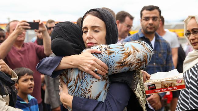 Jacinda Ardern hugs a mosque-goer in the wake of the Christchurch attack. Picture: Getty Images.