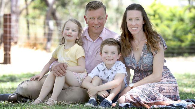 Adam Weinert, his partner Teresa Langmead and their children, Annalies and Wolfi. Their family lost their business and their house in the fires. Picture: Dean Martin