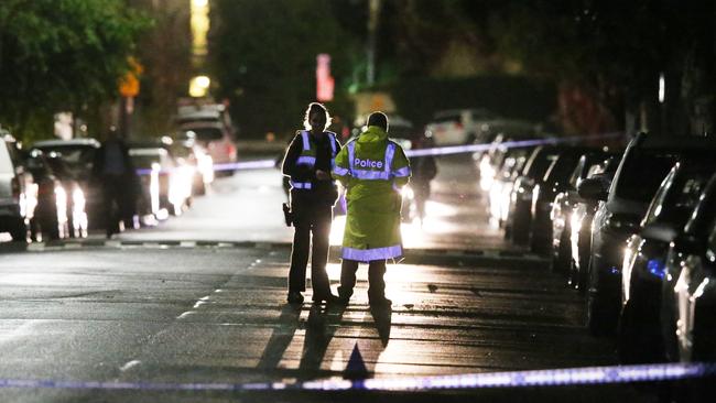 Police at the scene of the crime in Westbank Terrace. Picture: David Crosling