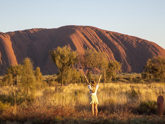 Sunrise at Uluru ... Territorians have been handed a multimillion-dollar incentive to explore their own backyards. Picture: Tourism Australia