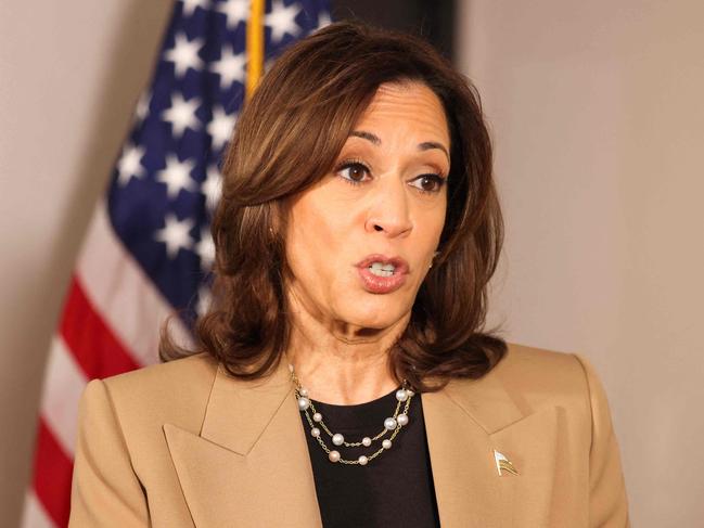 US Vice President and Democratic presidential nominee Kamala Harris speaks to the press in her hotel in Philadelphia, Pennsylvania, October 24, 2024 before leaving to Georgia. (Photo by Charly TRIBALLEAU / AFP)