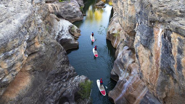 Paddle-boarding through Cobbold Gorge.