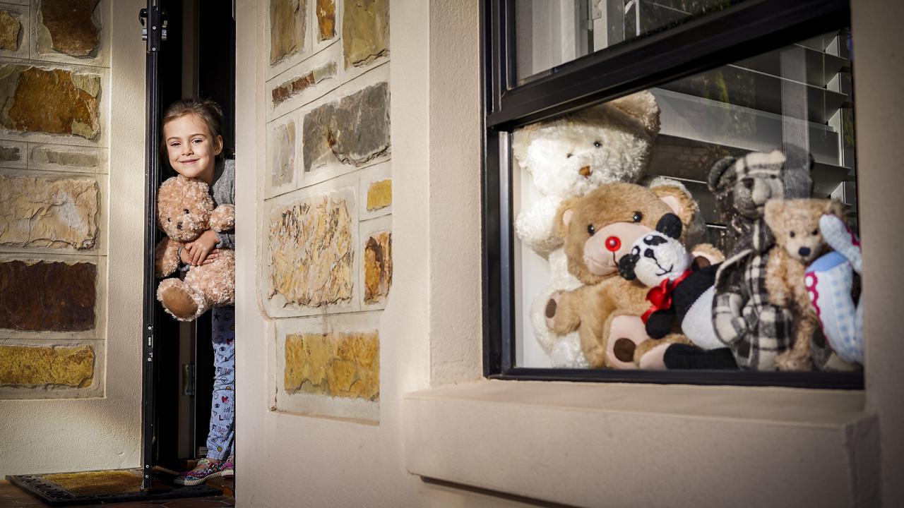 Evie with her bears in the front window on March 26, 2020. Picture: AAP
