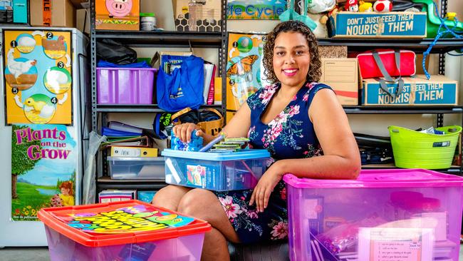 Primary schoolteacher Natalie Montague-Clarke at home with her spare school supplies. Picture: Richard Walker