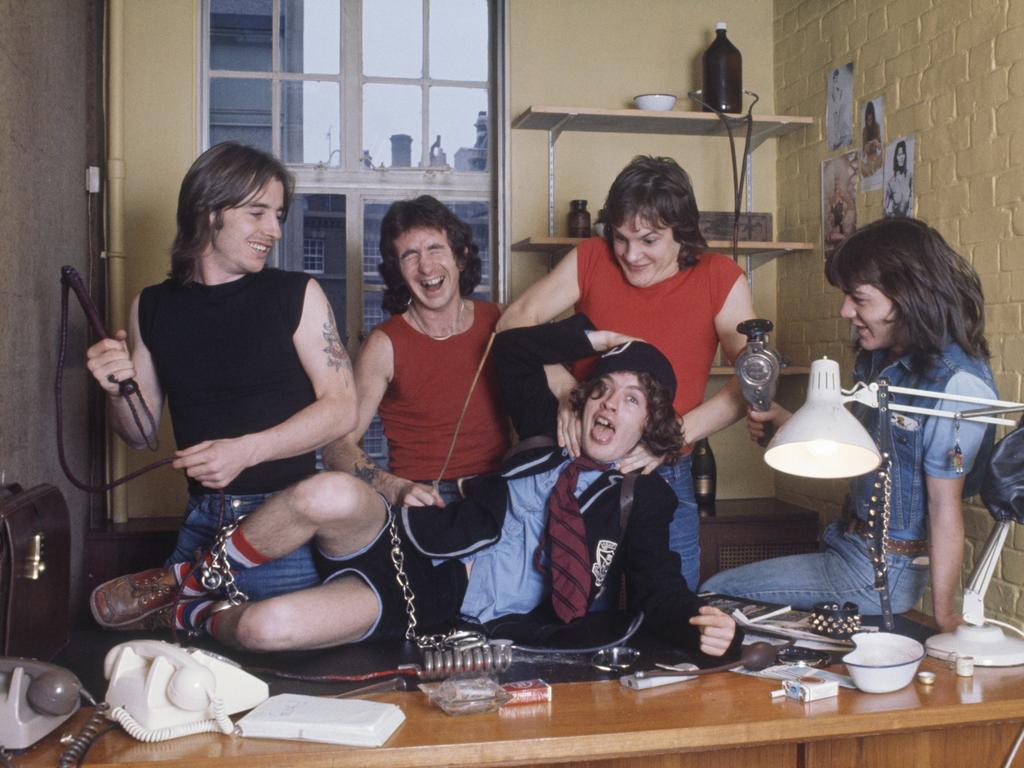 AC/DC group portrait, London, July 1976, (from left) Phil Rudd, Bon Scott, Angus Young, Mark Evans, Malcolm Young. Picture: Michael Putland/Getty Images