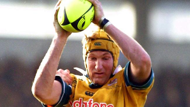 ##AFP PIC FEE PAYABLE CHECK BEFORE USE## Aust player Justin Harrison (top) with Norm Maxwell tackling.Rugby union - Australia Wallabies vs New Zealand All Blacks Tri-Nations match at Dunedin, NZ 11 Aug 2001.  a/ct/Rugby/International/matches