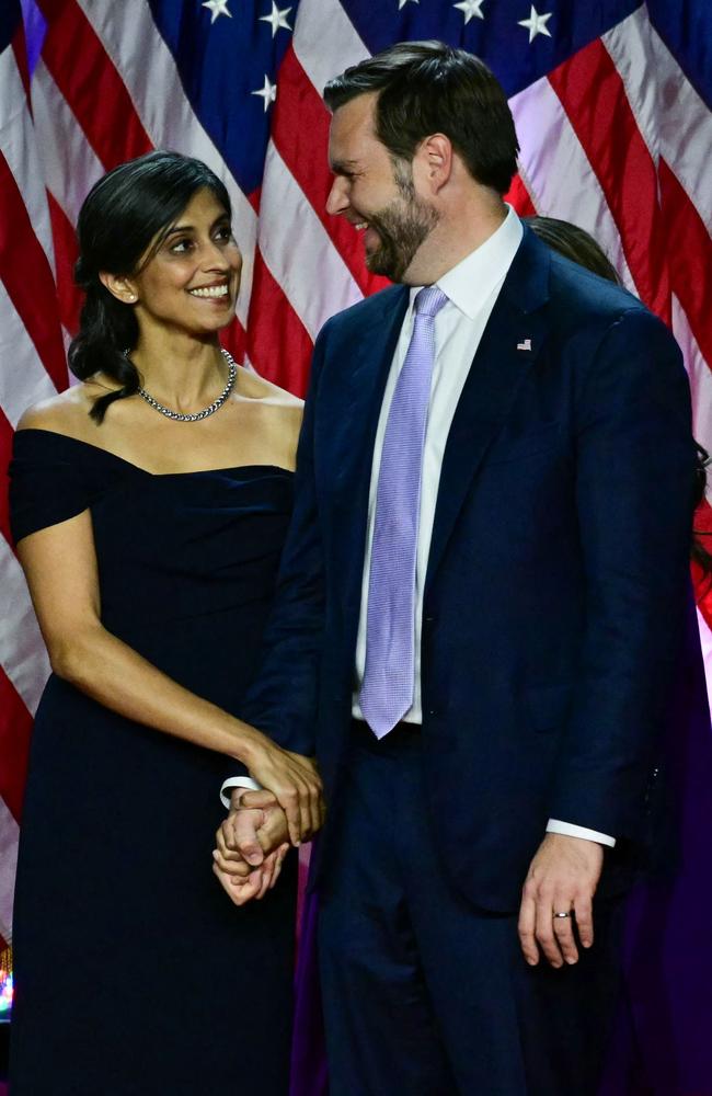 Republican vice presidential candidate JD Vance and his wife Usha listen to Donald Trump’s address to supporters. Picture: Jim Watson/AFP