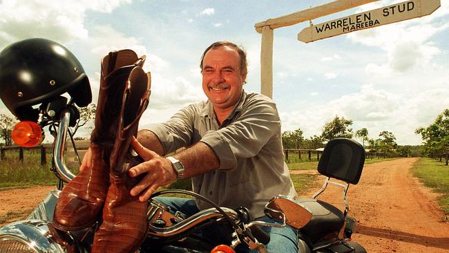 Warren Entsch pictured on his Harley Davidson in 2007 with crocodile-skin boots that he sent to the US President.