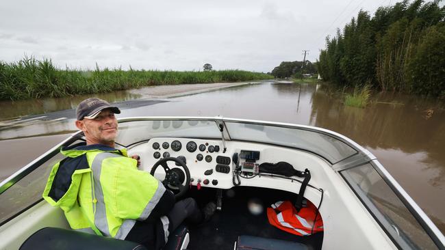 Flooding on the Gold coast in the aftermath of Cyclone Alfred. Stapylton homes surrounded by floodwaters..Tony Bailey from Airlift Hovercraft , uses one to check on the welfare of his neighbours. Picture Glenn Hampson