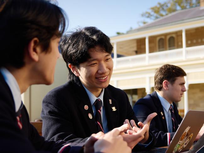 Cranbrook students in front of the school's boarding house.