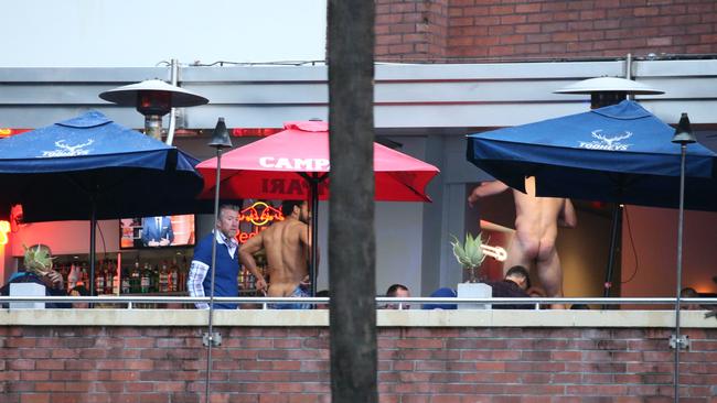 Asipeli Fine and Adam Elliott strip off at the Harbour View Hotel. Picture: Justin Lloyd.