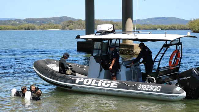 Police divers are searching an area of the Maroochy River, near Bradman Av in Maroochydore, where a man's body was found last week. Picture: Letea Cavander