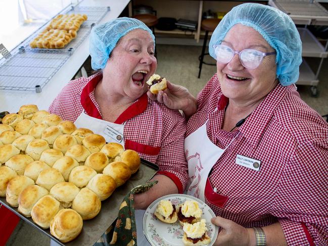 CWA ladies Bernadette McNamara from Edwardstown and Sally Lightburn from Murray Town in the Flinders Ranges celebrate baking the last batch of over 12500 scones in the CWA kitchen during the last day of the Royal Show Sunday,September,10,2023.Picture Mark Brake