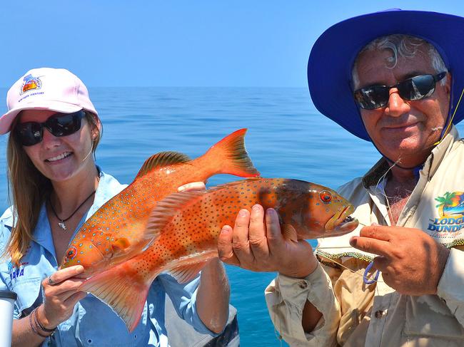 Bonnie Keogh and Con Pizanias with a brace of coral trout.