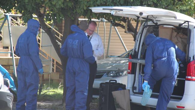 Forensic officers and detectives spent about an hour inside the property. Picture: NCA NewsWire / Anthony Anderson