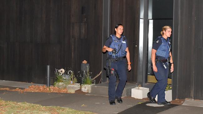 Police leaving the townhouse where Whole Pentry founder, Belle Gibson lives. Picture: Jay Town