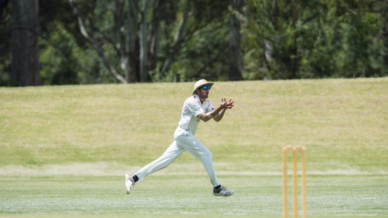 George Casey takes a catch for Highfields to dismiss Hemal Shah of University in round five A Grade One Day Toowoomba Cricket at Highfields Sport Park, Saturday, November 5, 2022. Picture: Kevin Farmer