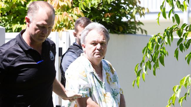 Peter Foster in custody at the Port Douglas house he had been staying in for several weeks. Picture: Jessie Goetze