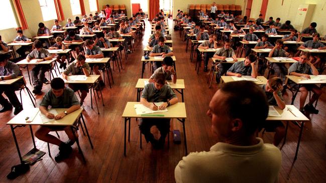 Ashfield Boys High school students sitting for the ELLA literacy test, Mar 01 1999 NSW / Education / Exams examinations classroom pupils teacher Generic