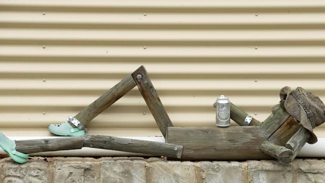 A reclining statue, the efforts of Martin ‘Arty Marty’ Devries of Omeo.