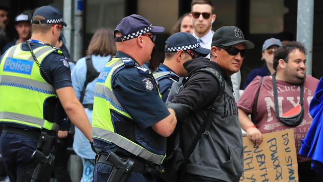 A man is arrested. Picture: Alex Coppel.