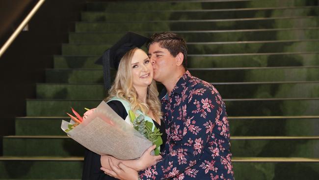 Gabrielle Noack is congratulated by her husband Jack Noack after graduating with a Bachelor of Nursing with distinction at the CQU Cairns mid-year graduatiion ceremony, held at the Cairns Convention Centre. Picture: Brendan Radke