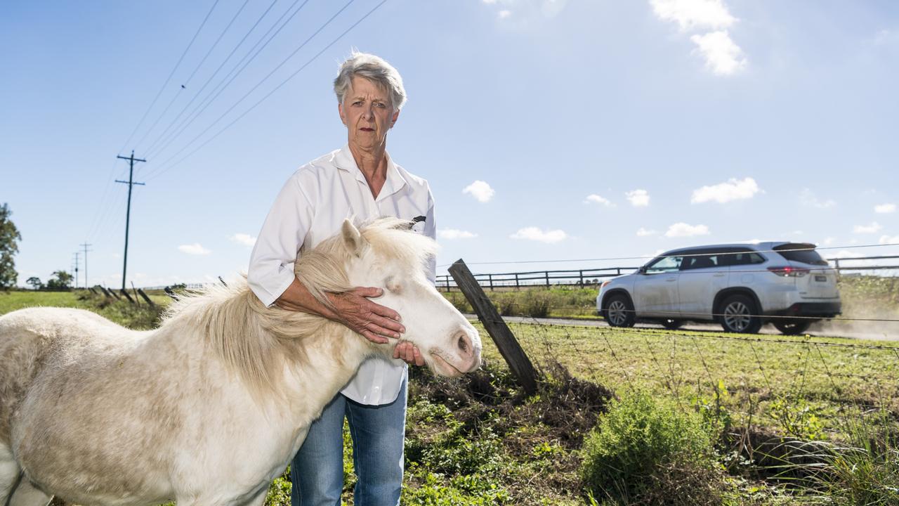 Denise Watson with Bailey, who is blind after she says dust from Deuble Road, Wellcamp, caused the horse to have repeated eye infections, Tuesday, April 20, 2021. Picture: Kevin Farmer