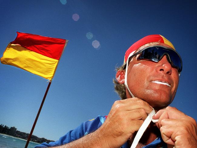 OCTOBER 4, 2000: David Baxter, marine biologist & club captain of Manly Surl Life Saving Club returning to work on Manly Beach monitoring sharks off Sydney, 04/10/00 after two weeks as volunteer of Olympic Games. Pic Lindsay Moller. P/