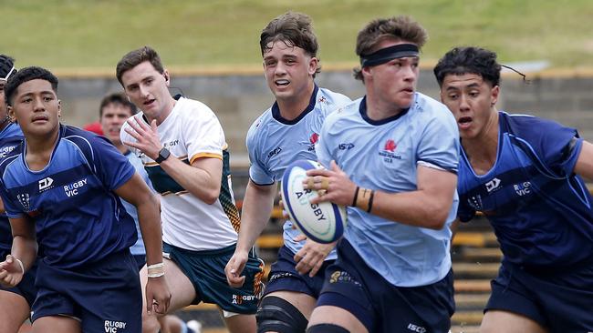 Catch me if you can! Aston Weir for the Waratahs Under 16s at Leichhardt Oval. Picture: John Appleyard.