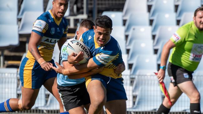 Tyrone Sau burst through the defence. Picture: Monique Harmer