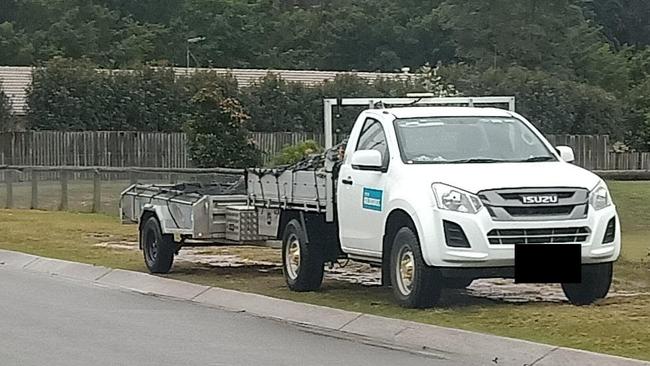 A council-branded vehicle parked on the nature strip adjacent to Pioneer Downs Park in Worongary.