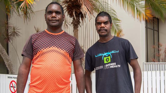 Mr Dooley’s nephew Bartholomas Dooley and his son Jake Dooley outside the Darwin Local Court on Tuesday. Picture: Pema Tamang Pakhrin