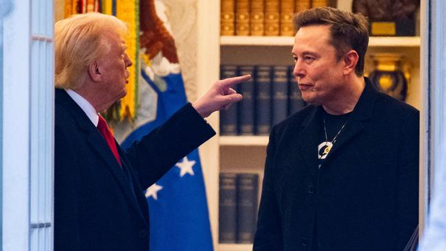 (FILES) US President Donald Trump speaks with Elon Musk (R) before departing the White House on his way to his South Florida home in Mar-a-Lago in Florida on March 14, 2025. President Donald Trump said on June 5, 2025, that he asked 