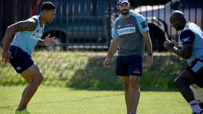 Israel Folau, left, at Waratahs training in Sydney earlier this week. Picture: Toby Zerna