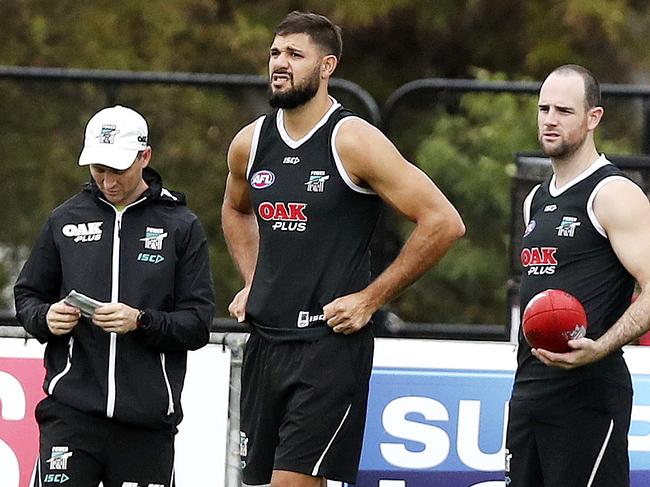 24/04/18 - AFL - Port training (warm-up) at Alberton Oval. Paddy Ryder and Matthew Broadbent. Picture SARAH REED