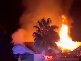 Residents have fled a massive blaze that destroyed a Paralowie home. Picture: 7NEWS