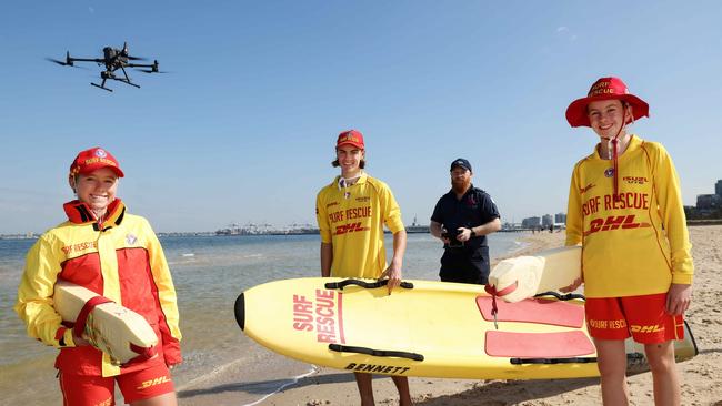 South Melbourne Life Saving Club members with a drone on South Melbourne beach. Picture: Ian Currie