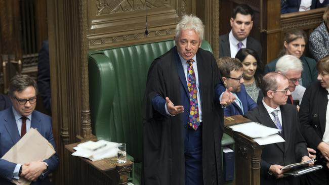 In this handout photo released by the House of Commons, speaker of the House John Bercow gestures after announcing he will be standing down, in the House of Commons in London, Monday, Sept. 9, 2019.  A colorful era in British parliamentary history is coming to a close with Speaker of the House John Bercow's abrupt announcement Monday that he will leave his influential post by the end of October. (Jessica Taylor/House of Commons via AP)