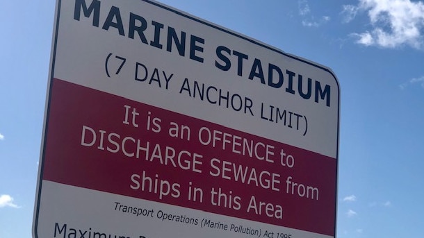 Signage at the Marine Stadium, known as Bum's Bay, at The Spit, warning about anchor limits.