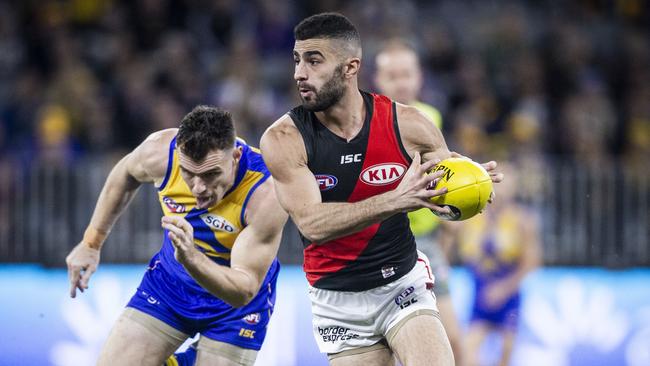 Adam Saad breaks clear of Luke Shuey. Picture: AAP