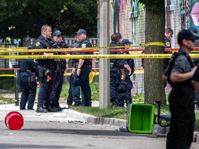 MILWAUKEE, WISCONSIN - JULY 16: Officers patrol the crime scene where a man was shot and killed by police near King Park on the west side of Milwaukee, Wisconsin. Security has been heightened around the RNC grounds since the attempted assassination of former President Donald Trump at his rally in Butler, Pennsylvania on July 13th.   Jim Vondruska/Getty Images/AFP (Photo by Jim Vondruska / GETTY IMAGES NORTH AMERICA / Getty Images via AFP)