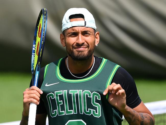 Nick Kyrgios practising in a Boston Celtics singlet on day eleven of The Championships in Wimbledon last year. Photo: Shaun Botterill/Getty Images.