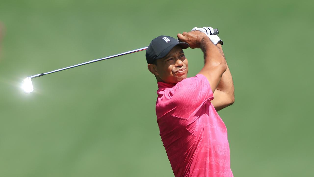 Tiger Woods plays his shot on the fifth hole during the first round of the Masters at Augusta National Golf Club on April 07, 2022 in Augusta, Georgia. (Photo by David Cannon/Getty Images)